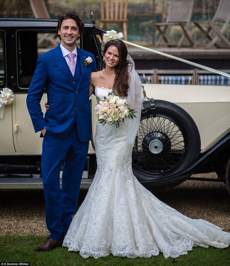Happy couple: David and Cara on their wedding day in the outfits chosen for them by the public